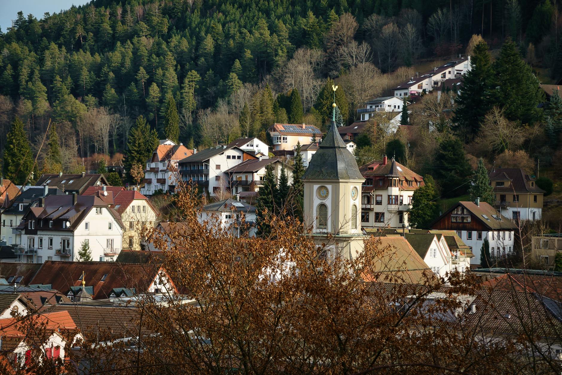 Charming townscape of Bad Wildbad in Germany with lush forest backdrop, showcasing picturesque architecture and landscape.