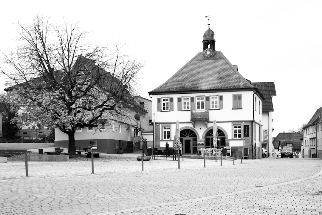 A black and white photo of a town square